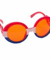 Oranje bril met gekrulde pootjes